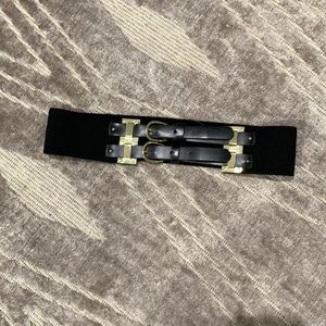 Stylish black and gold belt size XS